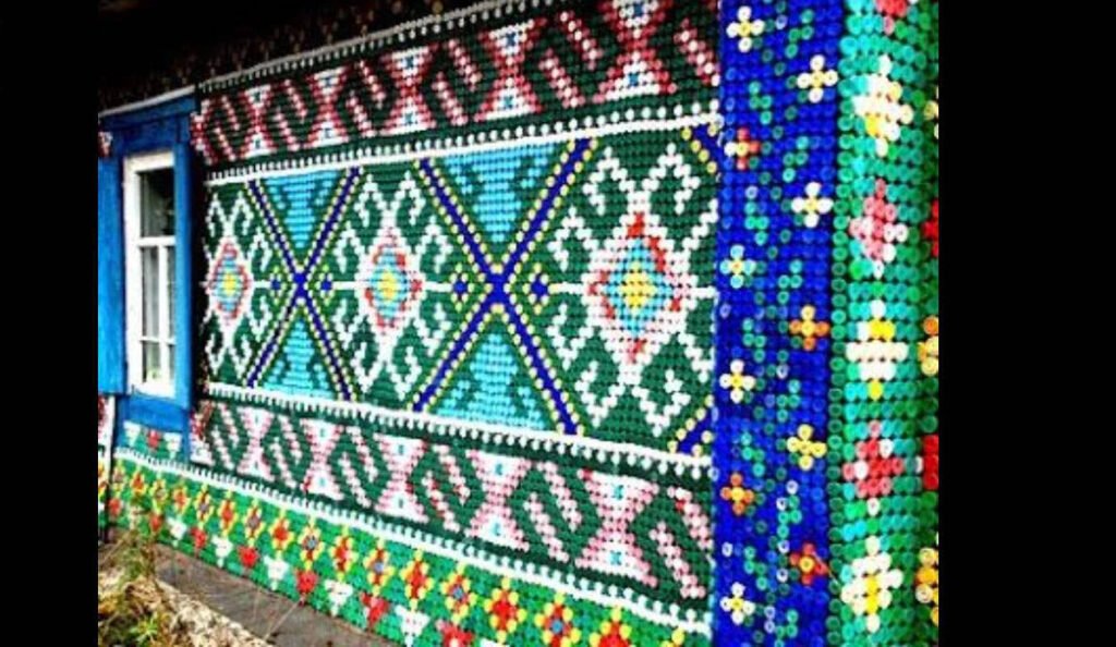 A Russian pensioner covered her Siberian home with 30,000 colourful bottle caps; the unusual recycling project turned a wooden house into a giant work of art