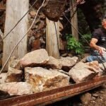 At 15, Jim Bishop bought 2.5 Colorado acres with $450 he earned mowing lawns and delivering papers; 10 years later, he began a stone castle that he spent 50 years turning into the world’s largest one-man project