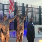 In 2001, two Seattle Mariners raised an American flag after clinching their division days after 9/11; 25 years later, that moment has become a permanent stadium statue