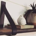 DIY Home Decor Hack: Turn old belts into stylish floating shelf brackets to save money and add style idea
