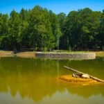 A 1950s farm pond at one of Georgia’s busiest parks had leaking banks, failing pipes and decades of sediment; Roswell spent $3.1 million rebuilding it to manage runoff from 52 acres