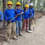 A former fuel-tank farm beside an Alaska national park visitor center has been erased; a young conservation crew restored 15,000 square yards of landscape and built 500 feet of new trail