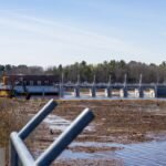 In 2020, a Michigan dam failure drained Sanford Lake; six years later, the water returned and a beach festival launched in 2005 came back to its original shoreline