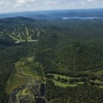 Developers once planned Adirondack Park’s largest residential project on 5,800 New York acres; after years of failure and foreclosure litigation, the land is headed for public auction