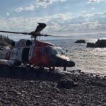 A 70-year-old hiker disappeared on Michigan’s remote Isle Royale for a week; backpackers helped find him injured and hypothermic before a Coast Guard helicopter hoisted him out