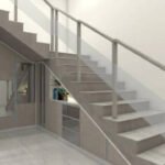 The space under your staircase could become a reading nook, pantry or home office