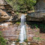 An Illinois waterfall and canyon photographed as a tourist attraction in 1903 remained largely closed to the public for generations; its corporate owner has now donated more than 50 acres so it can become a public park