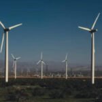 Iowa livestock farmer Dave Johnson hosts four wind turbines that bring in about $30,000 a year, calling the steady lease income the 401(k) he never had while he continues raising cattle and hogs