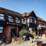 More than 300 objections filed as Maidstone residents oppose plans to convert former Grange Moor Hotel into 42 studio apartments for 65 people, warning of added pressure on parking and infrastructure