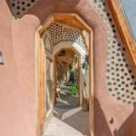 In 2011, a Wyoming couple built a 1,500-sq-ft off-grid home from 1,343 tyres on 55 acres, adding a 66-foot greenhouse, solar panels and rainwater systems; 15 years later, the unusual Earthship is listed for $625,000