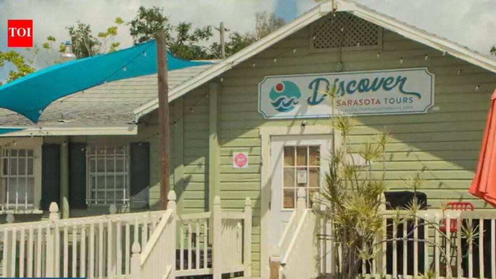 Florida couple’s colorful Sarasota cottage village houses 17 small businesses; a 324-apartment plan threatened demolition, but owners canceled the sale and took the property off market