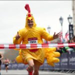 A man ran 26.2 miles in a giant inflatable chicken costume; he broke a Guinness World Record while raising more than £2,200 for vulnerable children | World News