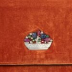 In 2018 or 2019, a thrift-store shopper paid just $1.50 for a purse because he thought it looked pretty; in a 2026 Antiques Roadshow episode, experts identified it as Cartier Art Deco and valued it at $35,000, with insurance above $100,000