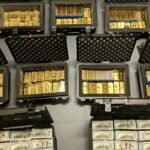 Federal executive with top-secret clearance created a fake classified program and diverted $145 million into luxury property and gold; after FBI found 298 gold bars, he pleaded guilty to a $193.6 million fraud