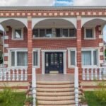 In 2003, two brothers bought a Queens home for $850,000; after racketeering convictions and years of forfeiture litigation, the property is heading to a federal auction with bidding starting at $900,000
