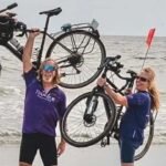A Utah couple began cycling across America on their 40th wedding anniversary; 87 days and 3,634 miles later, they reached the Atlantic coast and raised about $23,000 for two community charities