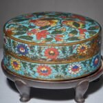 In 1946, a collector bought a Ming-era cloisonné pomegranate box for £19; 77 years later, it was found in an attic, auctioneers expected £6,000 to £10,000 before bidding pushed it to £288,000 | World News