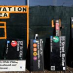 New Yorkers queued for hours to buy discarded subway hardware at an MTA sale where old signs cost $500 to over $1,000, orange seats sold for about $900 and Spike Lee picked up a Penn Station sign
