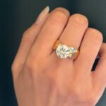 A UK woman paid £5 for a ring at a car boot sale, believing it was costume jewellery. An expert later identified it as an 18-carat gold ring set with a 3.02-carat natural diamond worth about £15,000!