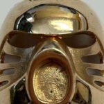 A Pennsylvania Goodwill received a small gold LEGO piece inside a donated jewelry bag and listed it from $14.95; collectors identified it as a rare 14-karat Bionicle mask and pushed the auction price to $18,101