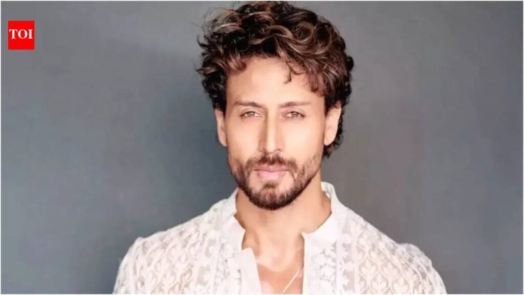 Tiger Shroff covers face, reaches home under police protection after Juhu firing; tape on hand draws attention | Hindi Movie News