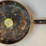 How to remove stubborn grease from stainless steel pans with a lemon: An easy cleaning trick to remove greasy residue and restore shine without harsh chemicals
