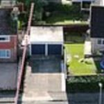 In 2022, a Russian Orthodox priest bought a £470,000 home beside a woman who paid £260,000 for hers; their fight over a one-metre strip of land has led to CCTV, criminal charges and a holy-water blessing at the fence